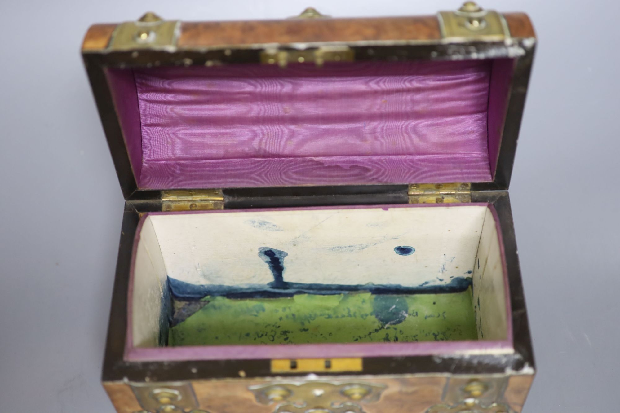 A Garrard rosewood and brass bound dome-topped box, a red leather humidor and a mahogany jewellery box